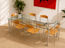 Load image into Gallery viewer, Mario Hasuike Seccose Italian dining set with rectangular clear glass table, architectural metal base and six wood and metal chairs.
