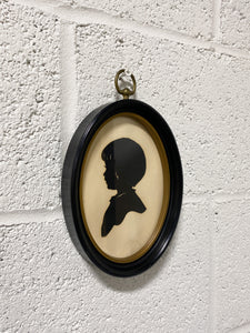 Vintage Silhouette of a Young Child