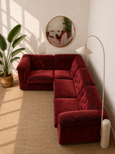 Load image into Gallery viewer, Overhead view of 1970s Italian Zanotta four-piece modular sectional sofa reupholstered in burgundy checkered velvet with tufted backs and rolled arms.
