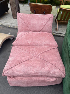Stitched pink chair and ottoman