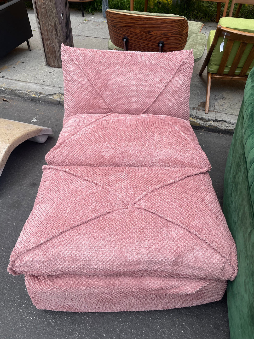 Stitched pink chair and ottoman