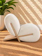 Load image into Gallery viewer, Image 3 of 5: Adele Lounge Chair in Vanilla Oat polyester fabric with sculptural curved form and natural wood frame
