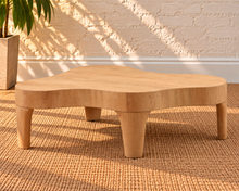 Load image into Gallery viewer, Alani solid oak coffee table in a natural oak finish with an abstract freeform tabletop, rounded edges, and tapered wood legs.
