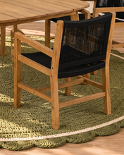 Load image into Gallery viewer, Alessia warm teak outdoor dining table with four black woven rope armchairs
