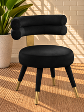 Load image into Gallery viewer, Althea Midnight Black velvet dining chair with deep channel tufted back and gold metal leg details
