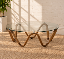 Load image into Gallery viewer, Amalia round glass coffee table with sculptural sinuous walnut wave base and metal glass supports.
