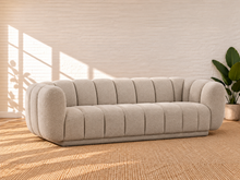 Load image into Gallery viewer, Image 2 of 4: Amanda upholstered sofa in Soft Biscuit chenille with rounded arms and vertical channel detailing
