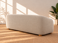 Load image into Gallery viewer, Image 5 of 6: Amara 85-inch upholstered sofa in Greige chenille with curved back, rounded arms, ball accent pillows, and wood bun feet
