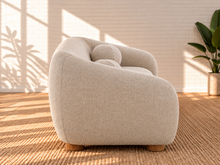 Load image into Gallery viewer, Image 6 of 6: Amara 85-inch upholstered sofa in Greige chenille with curved back, rounded arms, ball accent pillows, and wood bun feet

