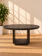 Load image into Gallery viewer, Image 2 of 4: Ansel 60-inch round dining table in Charcoal with burnished black finish and sculptural open pedestal base
