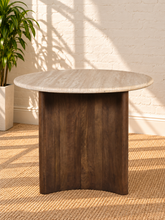 Load image into Gallery viewer, Archie 36-inch round dining table with genuine beige travertine top and solid mango wood pedestal in a rich natural brown walnut finish.

