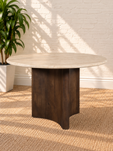 Load image into Gallery viewer, Archie 48-inch round dining table with genuine beige travertine top and solid mango wood pedestal in a rich natural brown walnut finish.
