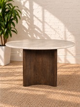Load image into Gallery viewer, Archie 48-inch round dining table with genuine beige travertine top and solid mango wood pedestal in a rich natural brown walnut finish.
