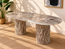 Load image into Gallery viewer, Atley oval dining table in Taupe genuine marble with fluted cylindrical bases and natural stone veining.
