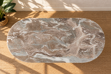 Load image into Gallery viewer, Atley oval dining table in Taupe genuine marble with fluted cylindrical bases and natural stone veining.
