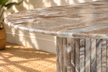 Load image into Gallery viewer, Atley oval dining table in Taupe genuine marble with fluted cylindrical bases and natural stone veining.

