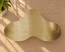Load image into Gallery viewer, Aurelia abstract coffee table in an Aurum brushed gold metal finish with a sculptural freeform shape and softly curved edges.
