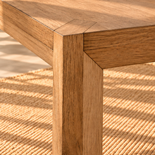 Load image into Gallery viewer, Image 4 of 4: Bernal 72-inch rectangular dining table in Natural Walnut with Ash Veneer, angled legs, and recessed apron detail
