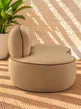 Load image into Gallery viewer, Image 3 of 4: Billy upholstered lounge chair in Camel velvet with brown piping and sculptural rounded silhouette
