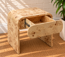 Load image into Gallery viewer, Blaise Natural Burl nightstand in solid burl wood with curved design and rounded integrated drawer.
