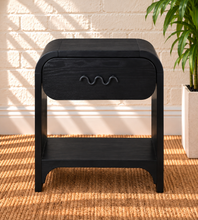 Load image into Gallery viewer, Byron charcoal wood nightstand with curved frame, drawer, matte black handle, and open lower shelf.
