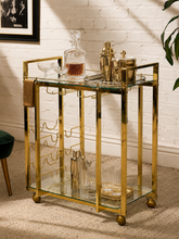 Load image into Gallery viewer, Vintage Hollywood Regency Brass Bar Cart with Glass Shelves
