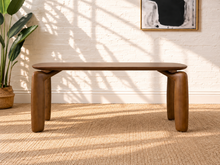 Load image into Gallery viewer, Cain rectangular dining table in warm walnut with rounded ash veneer top and four sculptural curved solid ash legs.
