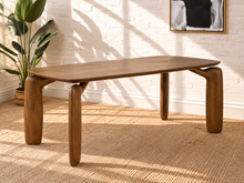 Load image into Gallery viewer, Cain rectangular dining table in warm walnut with rounded ash veneer top and four sculptural curved solid ash legs.
