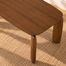 Load image into Gallery viewer, Cain rectangular dining table in warm walnut with rounded ash veneer top and four sculptural curved solid ash legs.
