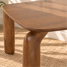Load image into Gallery viewer, Cain rectangular dining table in warm walnut with rounded ash veneer top and four sculptural curved solid ash legs.
