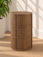 Load image into Gallery viewer, Cairo warm wood cylindrical storage side table with vertical fluted detailing and three sliding tambour doors

