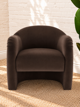 Load image into Gallery viewer, Capri lounge chair in Espresso performance velvet with curved barrel back, rounded arms, French piping, and pleated detailing
