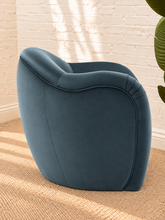 Load image into Gallery viewer, Capri lounge chair in Slate Blue performance velvet with curved barrel back, rounded arms, French piping, and pleated detailing
