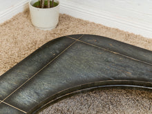 Load image into Gallery viewer, Curved Black Cerrused Distressed Coffee Table with Brass Accents
