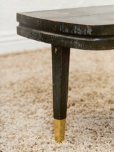 Load image into Gallery viewer, Curved Black Cerrused Distressed Coffee Table with Brass Accents
