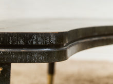 Load image into Gallery viewer, Curved Black Cerrused Distressed Coffee Table with Brass Accents
