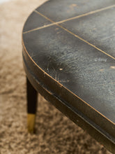 Load image into Gallery viewer, Curved Black Cerrused Distressed Coffee Table with Brass Accents
