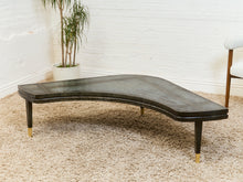 Load image into Gallery viewer, Curved Black Cerrused Distressed Coffee Table with Brass Accents
