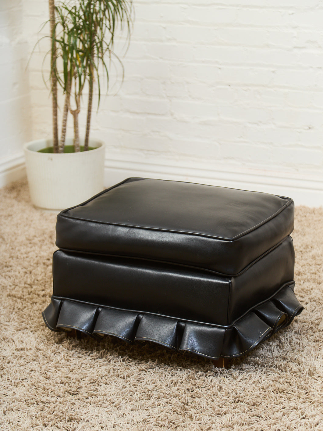 Ruffle Black Ottoman