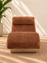 Load image into Gallery viewer, Carlyn sculptural chaise lounge in toasted chestnut polyester with curved upholstery and natural wood base.
