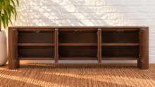 Load image into Gallery viewer, Carson six-door natural brown elm wood credenza with rich wood grain, concealed interior shelving, and rounded architectural end supports.

