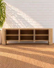 Load image into Gallery viewer, Carson six-door natural elm wood credenza with patterned wood grain, concealed shelving, and rounded architectural end supports.

