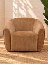 Load image into Gallery viewer, Carter camel chenille swivel accent chair with rounded wraparound back, plush seat cushion, and sculptural upholstered silhouette.
