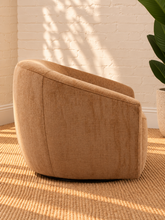 Load image into Gallery viewer, Carter camel chenille swivel accent chair with rounded wraparound back, plush seat cushion, and sculptural upholstered silhouette.
