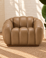 Load image into Gallery viewer, Casey honey brown genuine leather accent chair with rounded channel upholstery, curved arms and a slim wood base.
