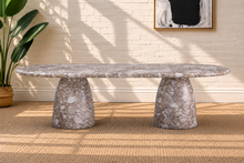 Load image into Gallery viewer, Celine oval dining table in Mocha brown marble finish with two sculptural tapered pedestal bases and rounded tabletop.

