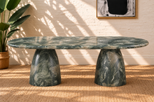 Load image into Gallery viewer, Celine oval dining table in Sage green marble finish with two sculptural tapered pedestal bases and rounded tabletop.
