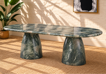 Load image into Gallery viewer, Celine oval dining table in Sage green marble finish with two sculptural tapered pedestal bases and rounded tabletop.

