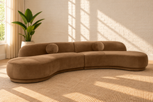 Load image into Gallery viewer, Chance 2-piece modular sectional sofa in Hazelnut Latte Saddle Velvet with sculptural curved seating, rounded back cushions, and circular accent cushions.
