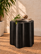 Load image into Gallery viewer, Clemens sculptural charcoal side table with curved Art Deco-inspired silhouette and oak veneer.
